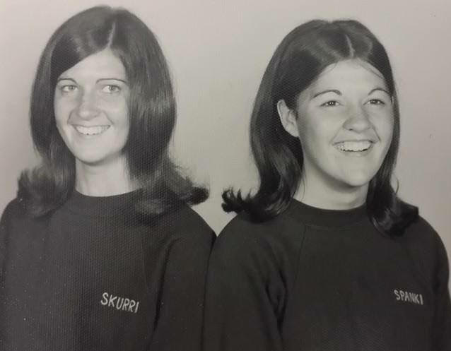 Sandi McGee 70, ‘Skurri,’ Sandi’s younger sister, Dale McGee Fry, ‘Spanki.’  They are wearing their Angel t-shirts with their Angel names. Therese Havins Miller 70